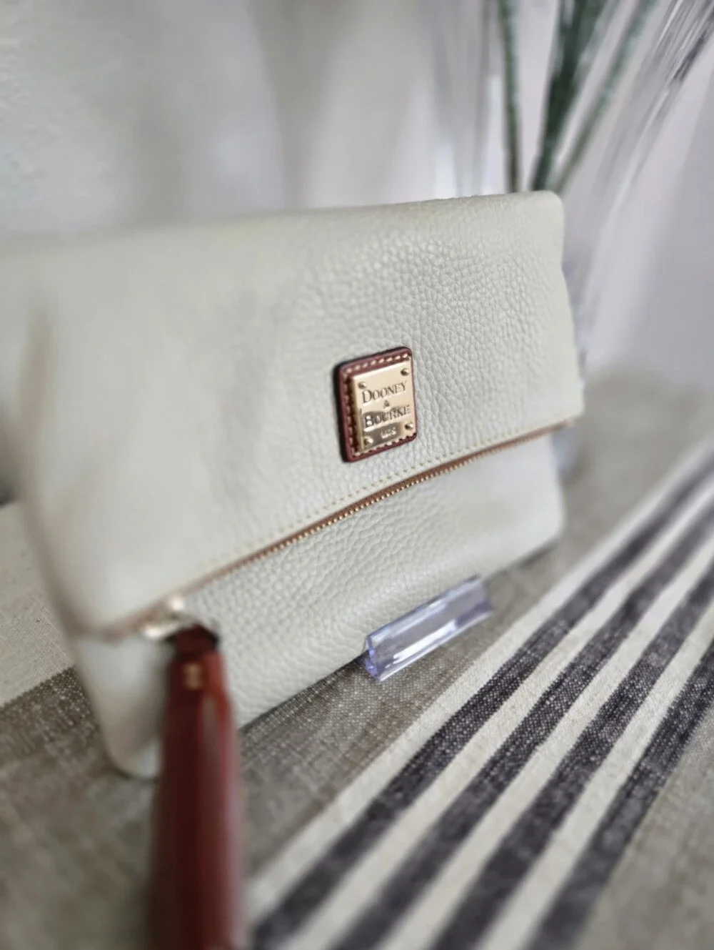 Dooney & Bourke Ivory Fold-Over Pebble Leather Clutch